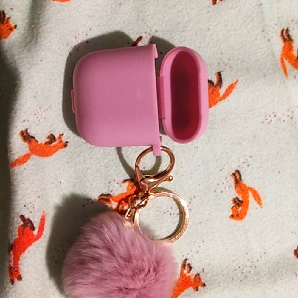 Purple Airpod 1/2 case with purple pom attached
